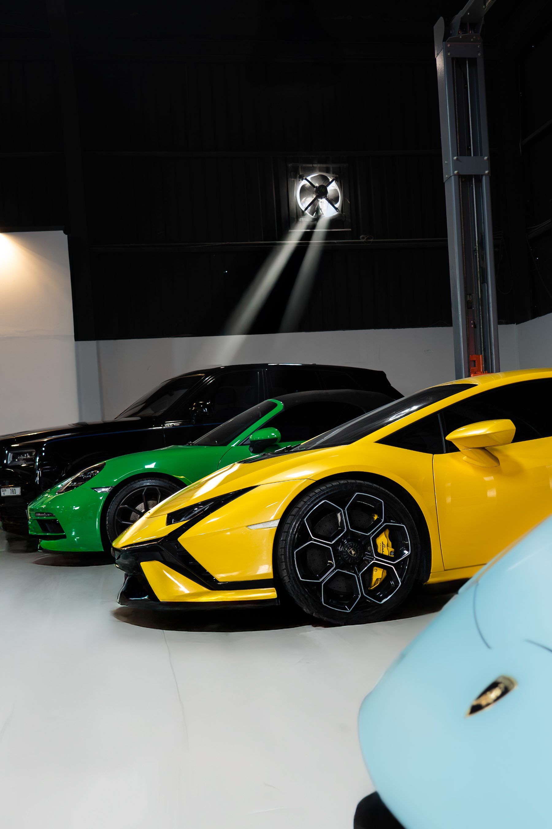 Lamborghini pair in garage
