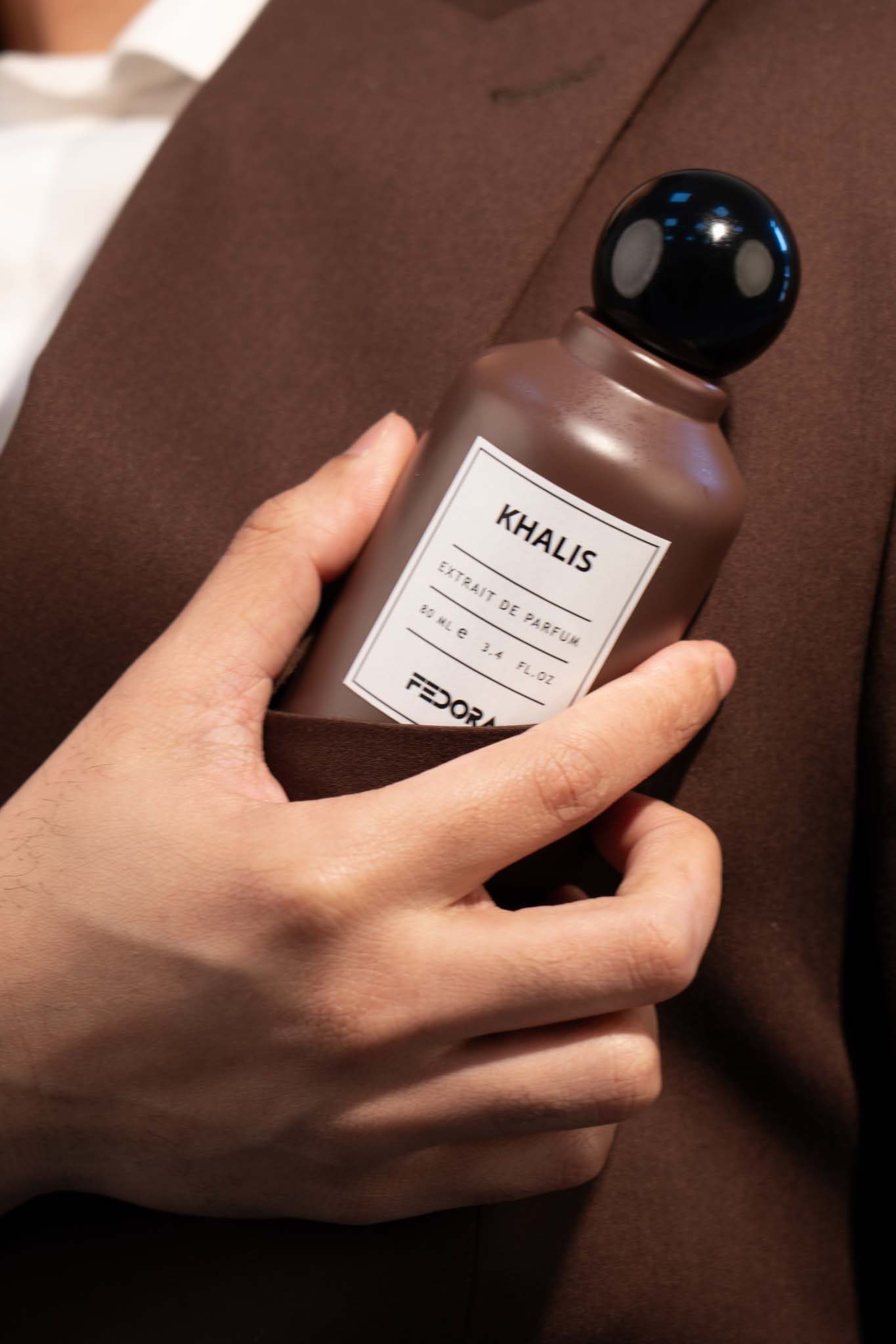 Khalis held close